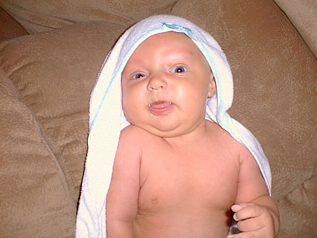 Elijah was making silly faces after his bath.