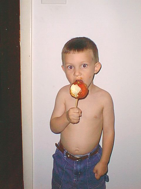 Timothy really likes to eat carmel apples.