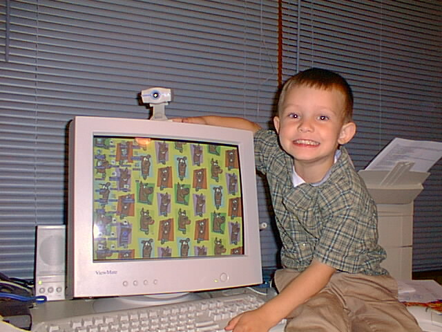 Timothy loves the Scooby background on the computer.