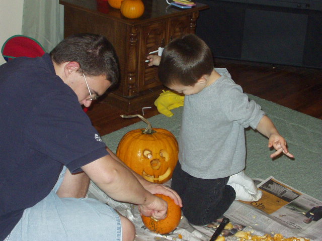 Daddy and Timothy carved my pumpkin for me.