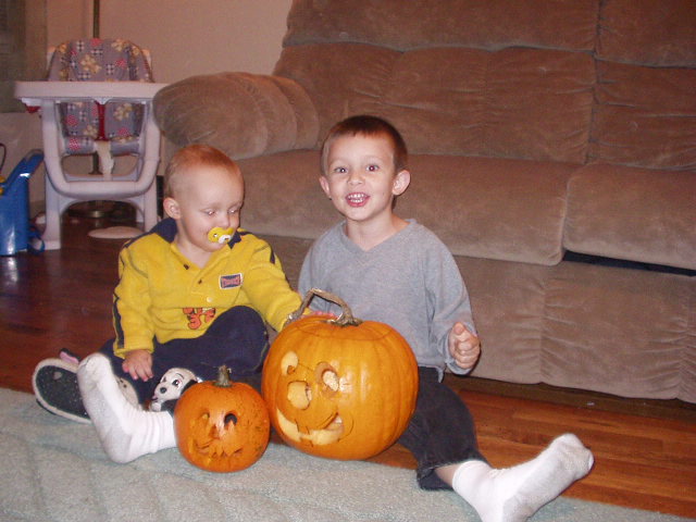 Timothy and Elijah with their finished pumpkins.