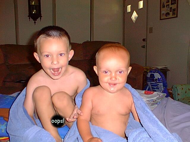 Timothy and Elijah making funny faces.