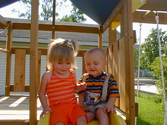 Kaitlyn & Elijah are fighting over who gets to go down the slide (wee) first!