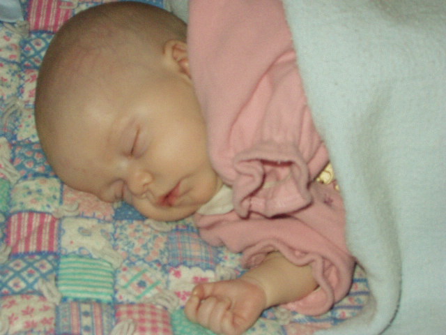 Mary sleeping after a long day. She is now 7lb 12oz :)