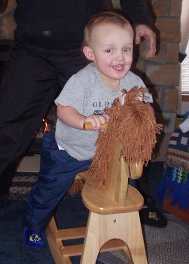 Elijah was riding his horse at Mamaw's. (Timmy calls her Memaw and Elijah calls her Mamaw)