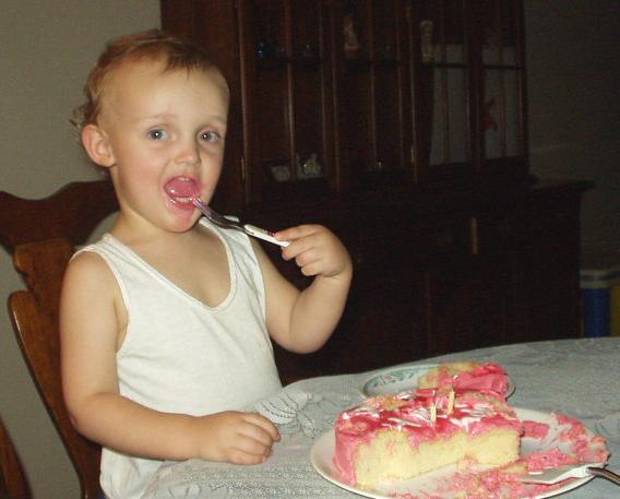 Elijah loved his birthday cake. We let him basically do whatever with his cake :)