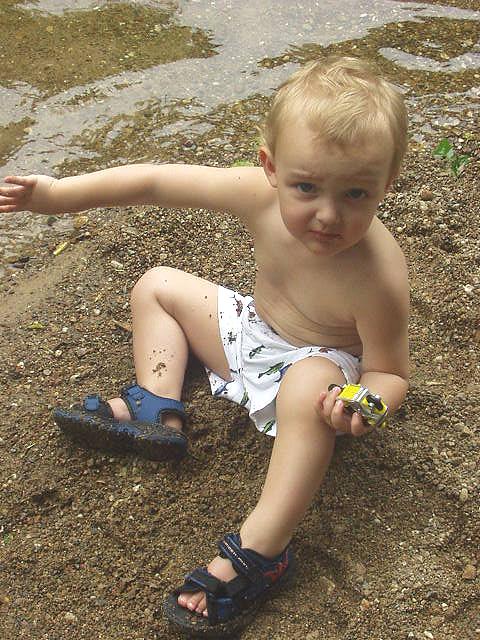 Elijah liked playing in the sand.