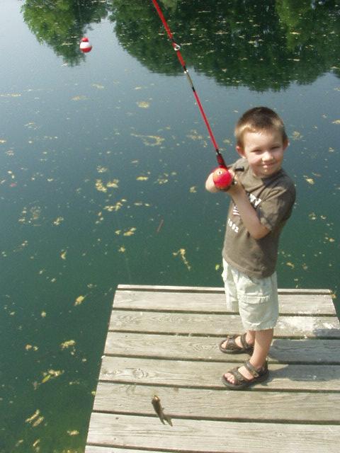 Timothy and his first catch!