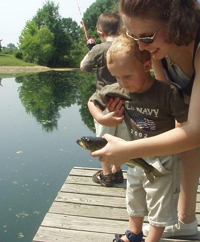 Elijah was worried about falling in..I think the fish was worried about breathing :)