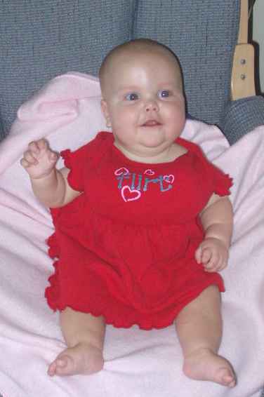 Aunt Joni stuffed my dress so I would look like Mommy :) hehe