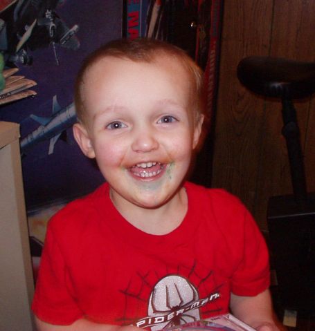 The orange color around my mouth is from cheese puffs and the blue is from a sucker. (I think we need to stop giving him blue suckers :)