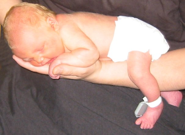 Daddy is holding Abigail for her pictures.