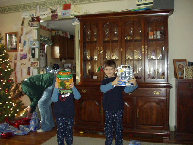 I think the ninja turtle ate Elijah's head. Timothy loved his mini cars!!