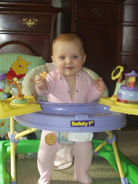 Abigail is keeping the cracker on her knee for later :)