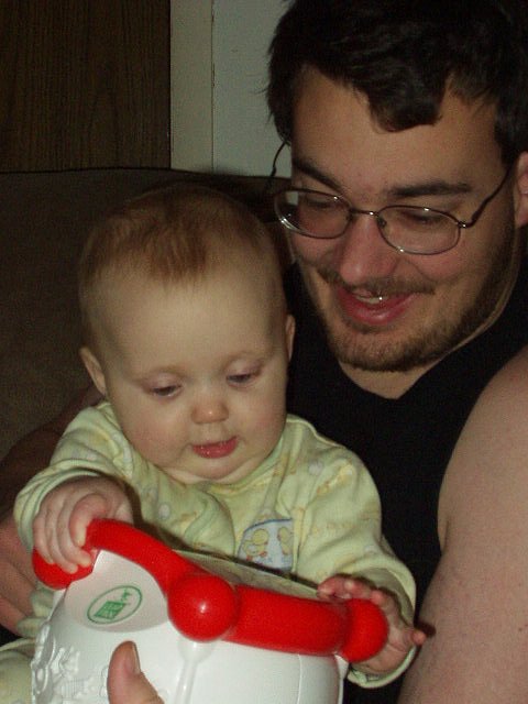 Daddy and Abigail had fun playing with the drum from Grandma Tena.