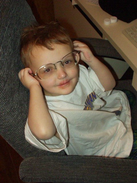 Elijah put on Daddy's glasses and said "I can see!". It was sooo cute.