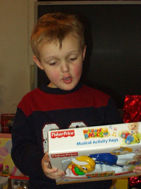 Elijah is really excited about Mary's toy :)