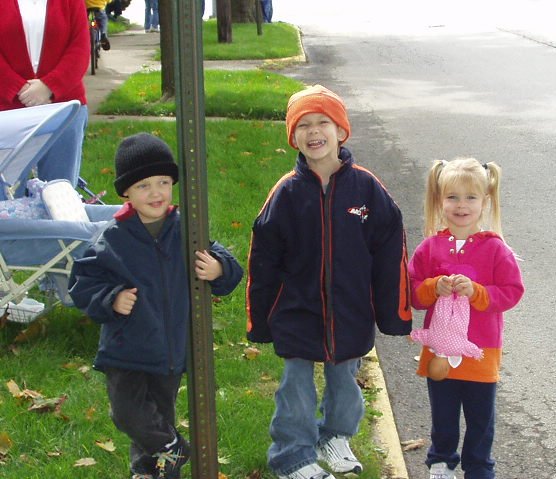 Let's see... We have Mamaw, Abigail, Elijah, Timothy and Kaitlyn waiting on the parade.