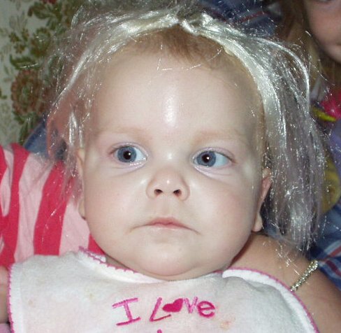 Mary is wearing barbie hair :)