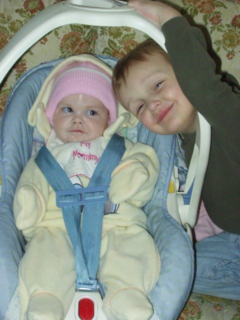 Mary is wearing the tweety outfit from Grandma Tena (of course Elijah had to be in the picture also:))