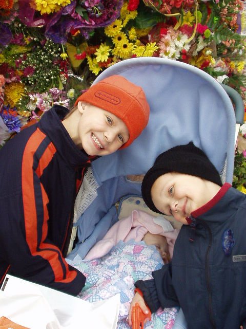 Ok, so we had to get a picture of Mary in front of the FLOWERS!!!!!!
