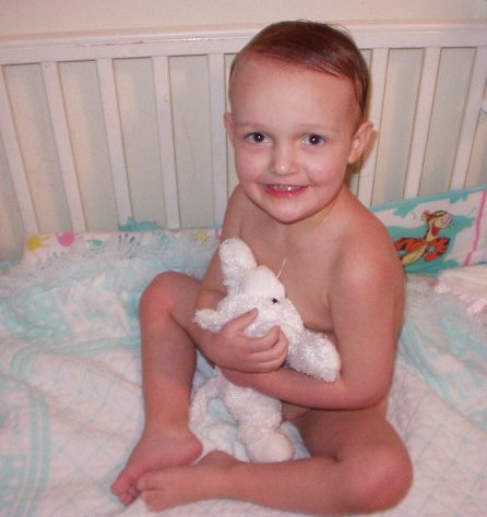 Elijah likes to climb into the crib and act like a baby :)