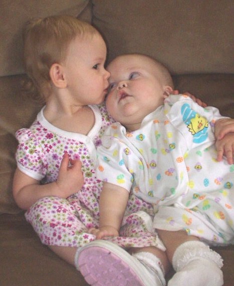 Caitlyn is giving Mary kisses :)