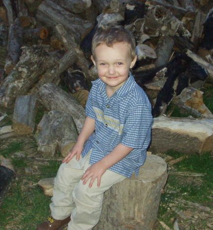 I think Elijah looks a lot like his Daddy in this picture.