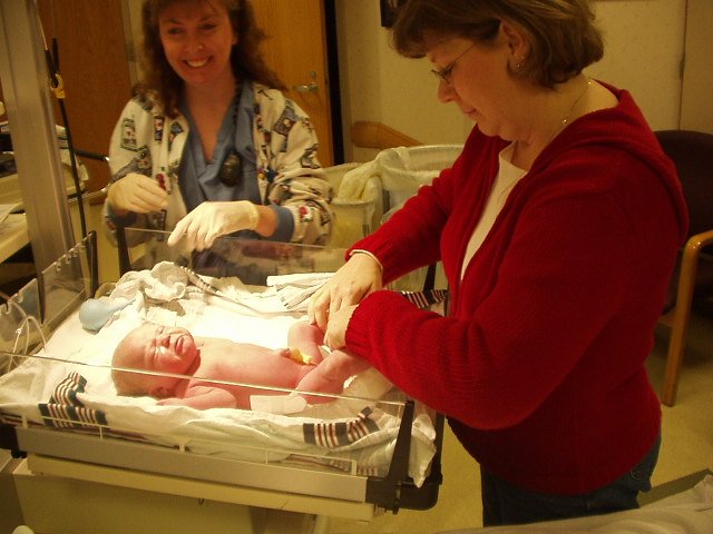 Daddy gave Mamaw the honor of putting my first diaper on!