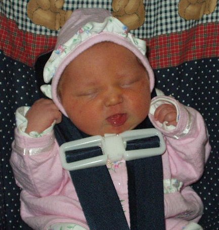 She looks so small in the car seat.