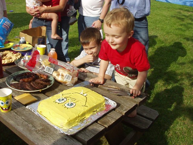 Elijah liked his cake :) and blowing out the candles!