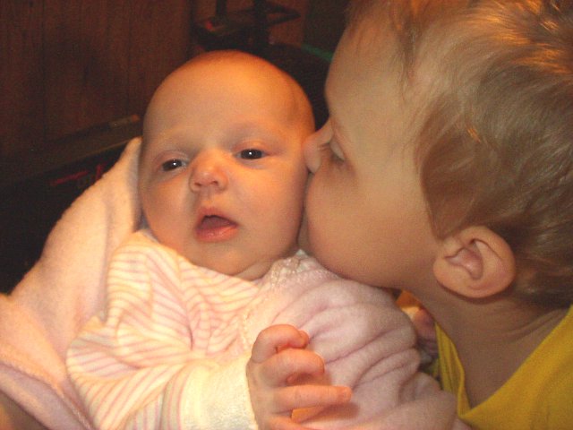 Elijah is telling Abigail a secret :)