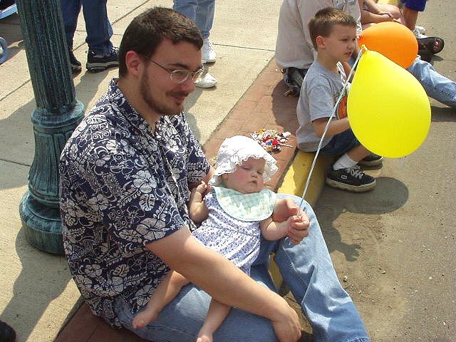 Daddy and Mary watching the parade.