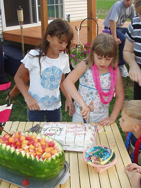 Brooke is cutting her cake :)