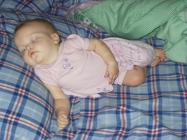 My sweet little baby girl :) Check out her nails :):)