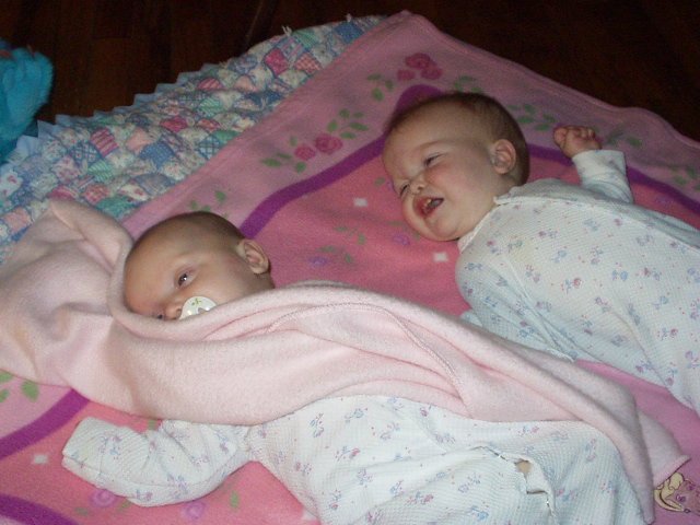 I don't want Abigail to go to bed!!  Abigial always sleeps with a blanket on her face (so cute!).