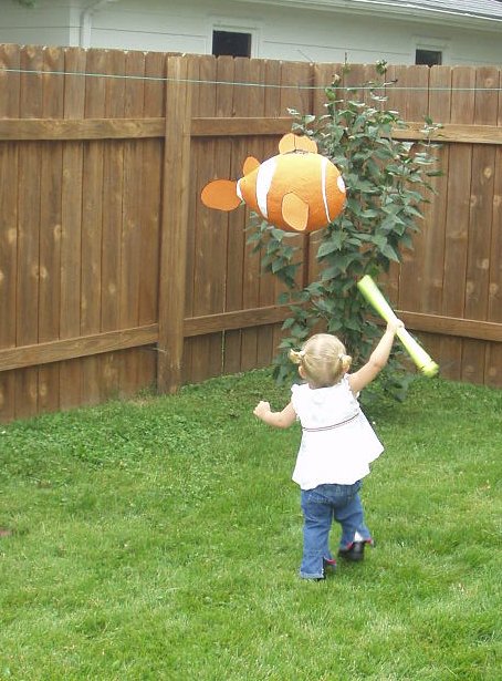 Caitlyn sure tried to put a dent in the Nemo piñata.