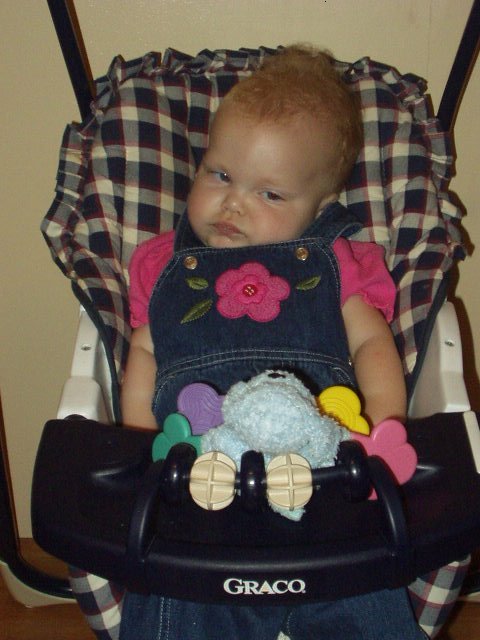 Does it look like I want my picture taken?? Huh..Huh..  Look at her hair :)