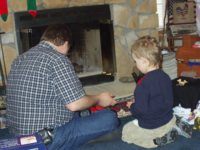 Reek is helping Elijah put his toy from Uncle Hans and Aunt Crystal together :)
