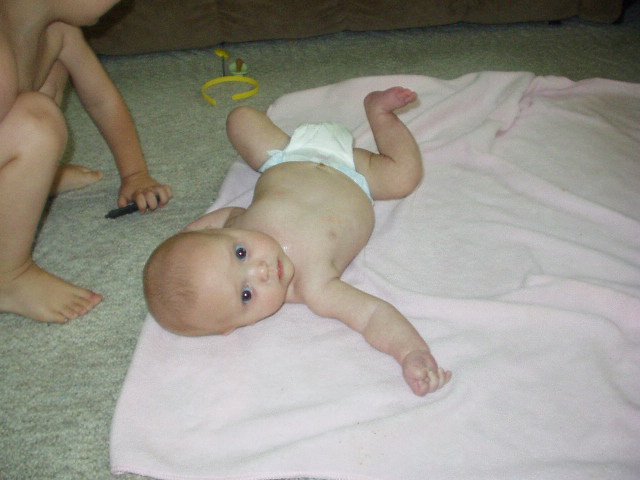 I rolled over for the first time!! wooohoooo!!!