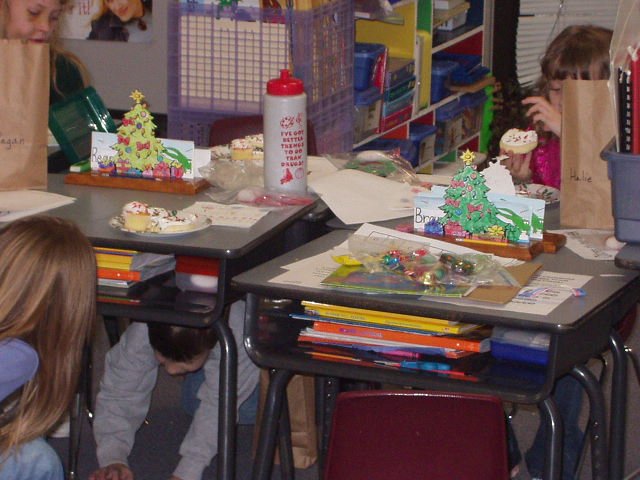 Timothy was trying to act 'cool' around his friends. So, he decided to hide under his desk?? :)