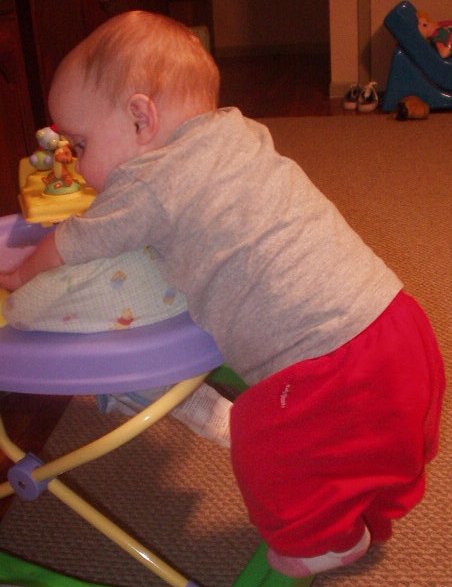 Abigail is trying to reach her cookie :)