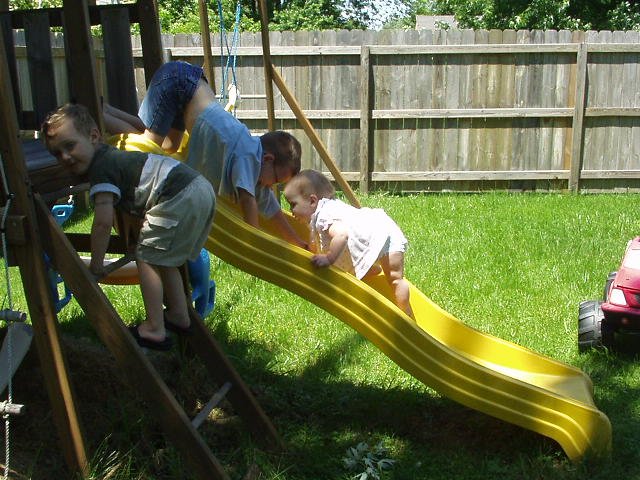 Abigail can climb all the way up the slide by herself! She is fearless!!