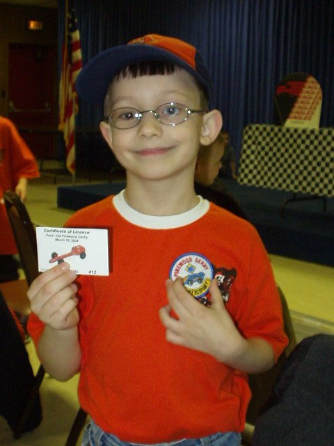 Timothy received a badge and a 'drivers license' tonight!!!