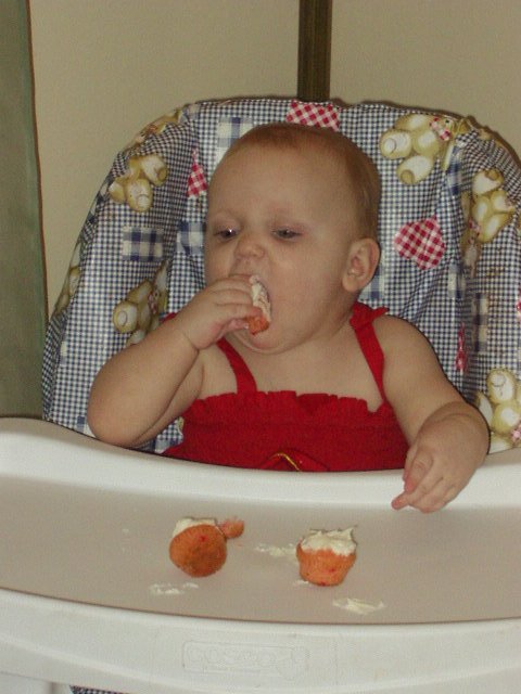 Abigail wasn't aware that you don't have to eat the cupcake in ONE bite!!