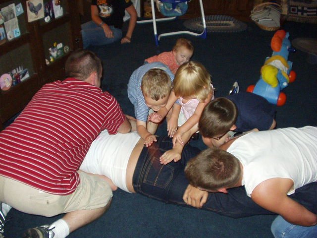 The boys held Aunt Joni down so we could spank her!!!