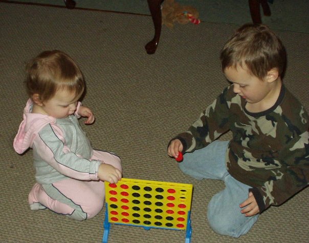 Elijah and Abigail have found their own way to play :)