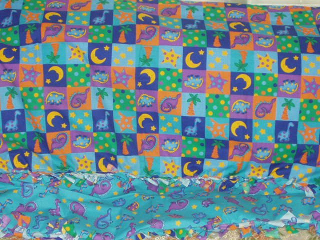 I made this blanket for Elijah. Aren't I such a good little stay-at-home-mommy-wifey!