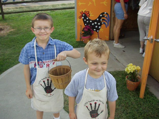 Timothy and Elijah head out to gather eggs and other items :)