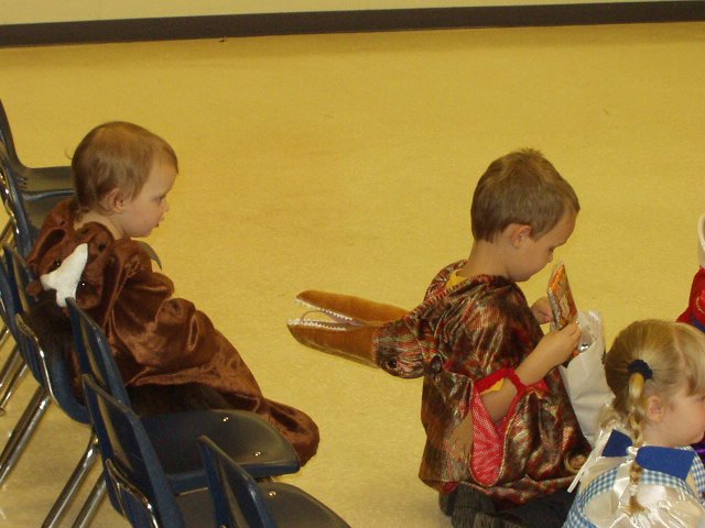 Elijah's costume is keeping an eye on Abigail :)